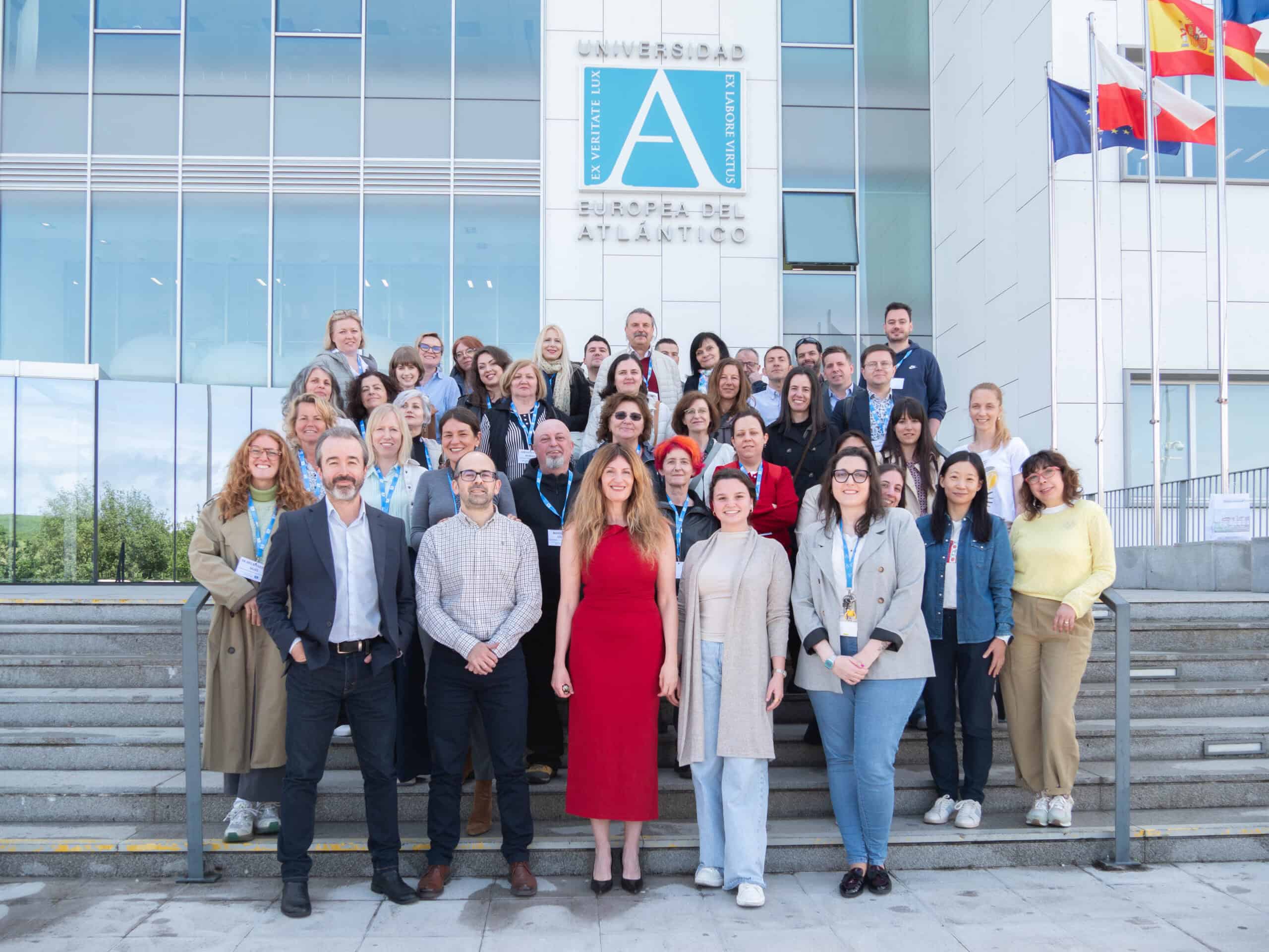 DIVERSE group of diverse university professionals outside of the European Atlantic University building.